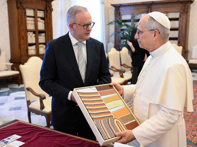 The pontiff was gifted a stunning Aboriginal artwork. Picture: Vatican Media