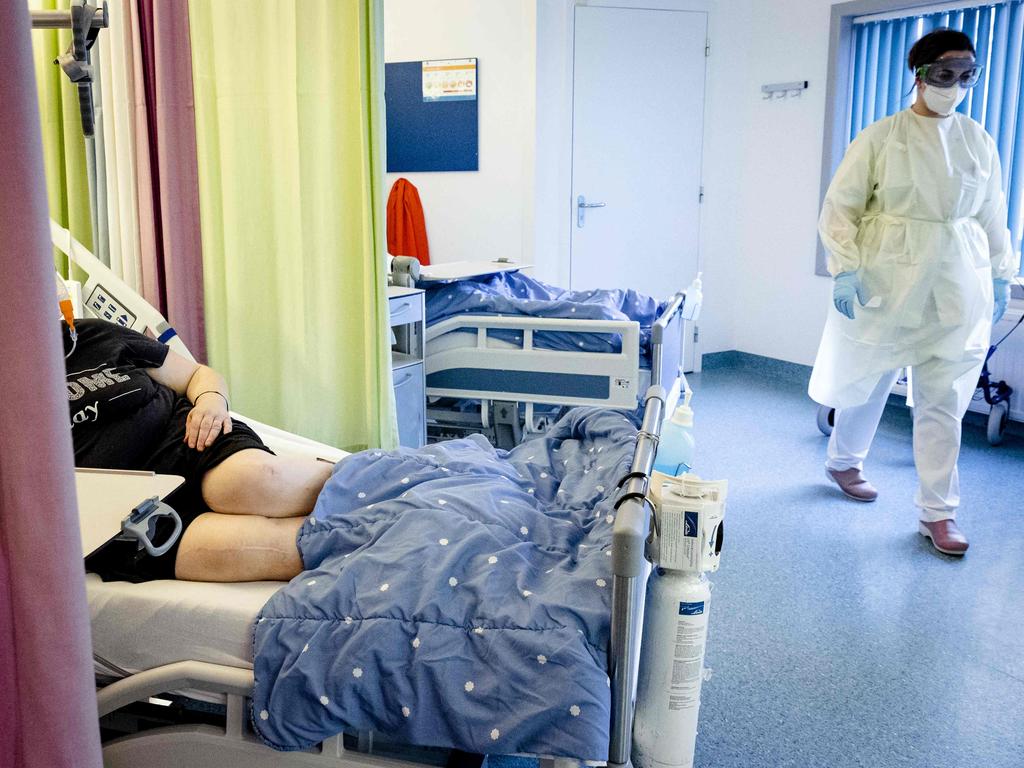 Nursing staff assist a coronavirus patient in the nursing department of Maastricht UMC in Maastricht. Picture: AFP