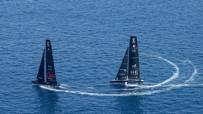 The Orient Express Racing Team and Alinghi Red Bull Racing compete on Race Day 1 of the Louis Vuitton Cup in Barcelona.