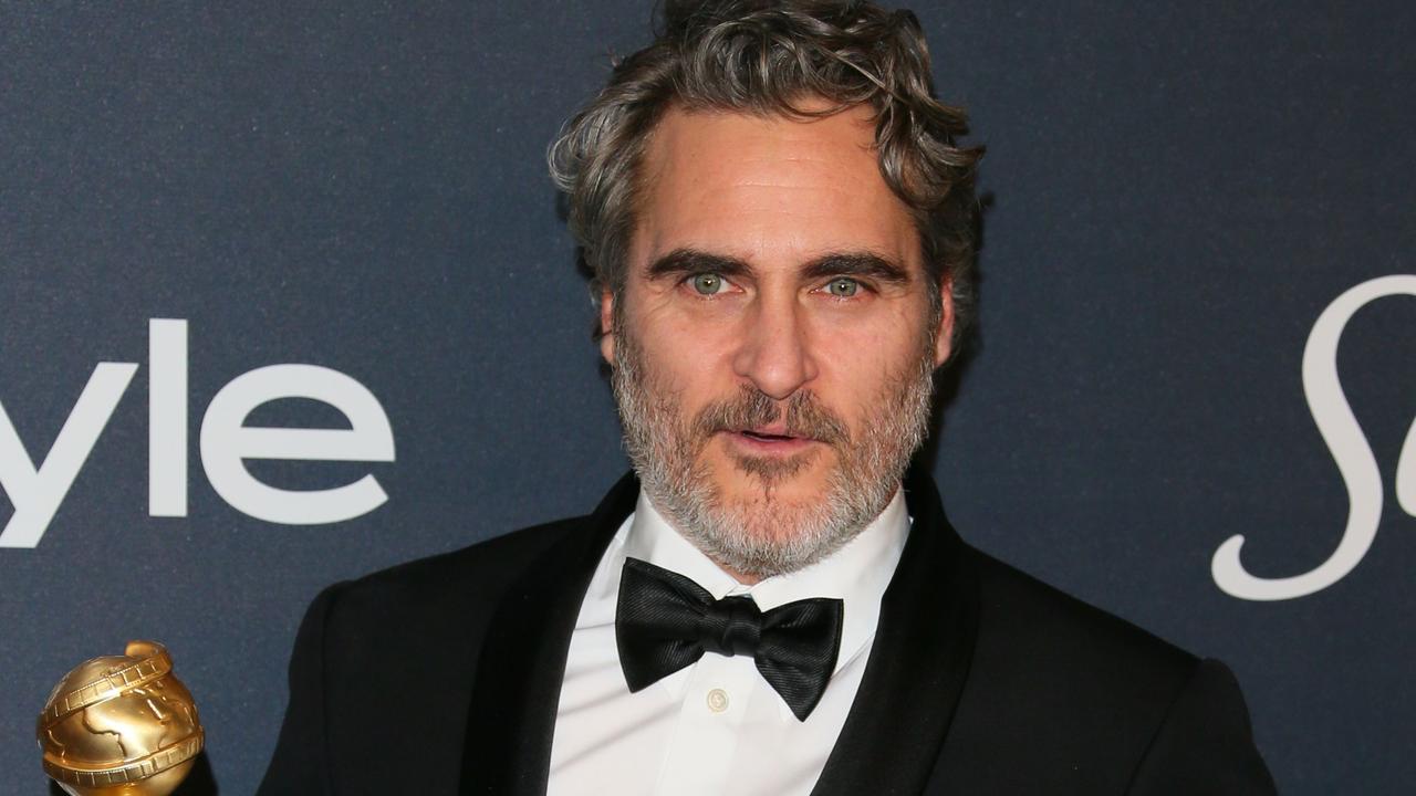 Golden Globes winner Joaquin Phoenix wears same tuxedo to every award