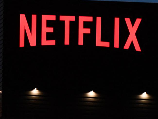 (FILES) The Netflix logo is seen on the Netflix, Inc. building on Sunset Boulevard in Los Angeles, California on October 19, 2021. Netflix on July 19, 2023 said subscriptions to the streaming television service climbed to more than 238 million in the wake of its crackdown on password sharing. Netflix finished the recently ended quarter with an addition 5.9 million subscribers and a profit of $1.5 billion, according to an earnings release. (Photo by Robyn Beck / AFP)