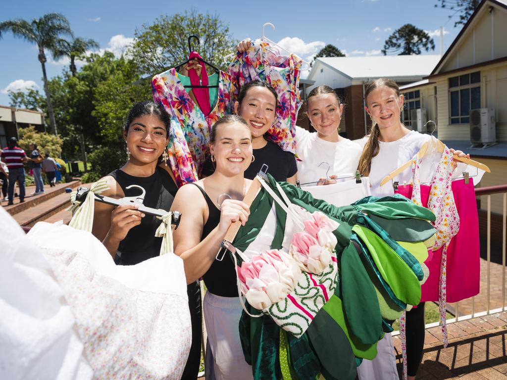 Fairholme fashion senior competition design winner Pip Lilford (front, centre) holding her winning design with student models (back, from left) Sruthi Gandu, Rachel Yap, Lizzie Kelly and Jordi Chesterfield at the Fairholme College Spring Fair, Saturday, October 21, 2023. Picture: Kevin Farmer