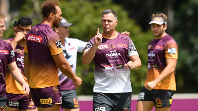 Broncos coach Anthony Seibold (2nd from right) is seen during Brisbane Broncos training at Clive Berghofer Field in Brisbane, Friday, February 22, 2019. The Broncos are playing the Wynnum-Manly Seagulls in a pre-season trial match on Saturday at Kougari Oval in Brisbane. (AAP Image/Darren England) NO ARCHIVING