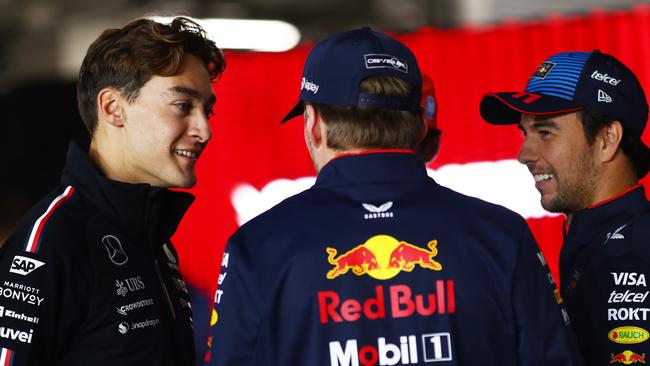 George Russell chats to Max Verstappen during the drivers parade. (Photo by Peter Fox/Getty Images)