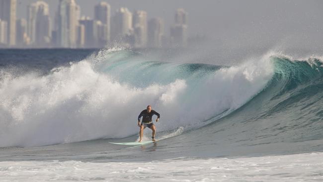 Surfers enjoying the larger than usual swell due to Tropical Cyclone Oma at Currumbin. Picture: Jerad Williams