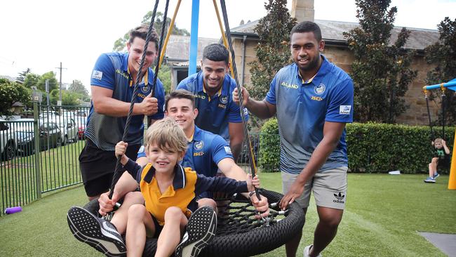 Eels players Steve Dresler with Reed Mahoney and Oregon Kaufusi at Giant Steps. Picture: Richard Dobson