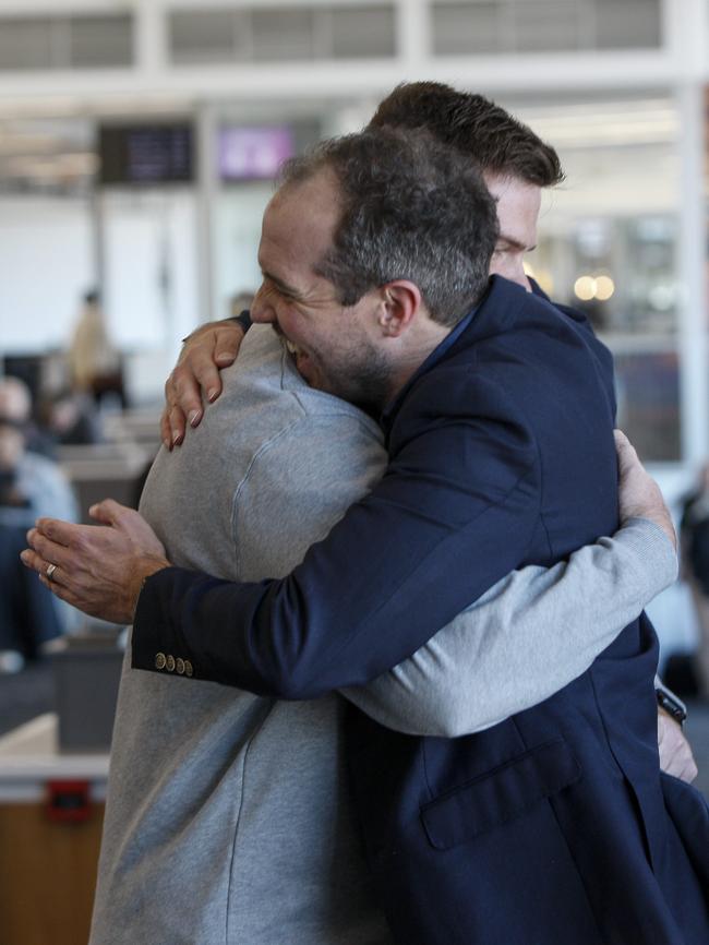 Sean and Ben reunite at Adelaide Airport in July this year. Picture: Brett Hartwig