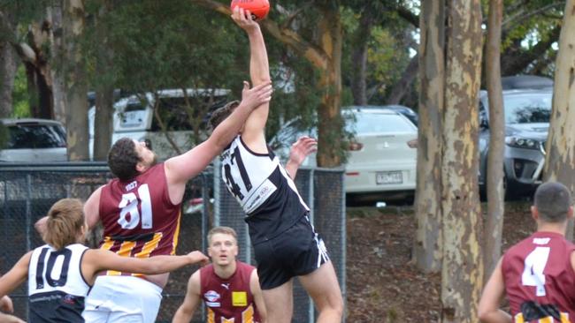 Ruckman Mathew Pollock left the field injured. Picture: Surrey Park FC