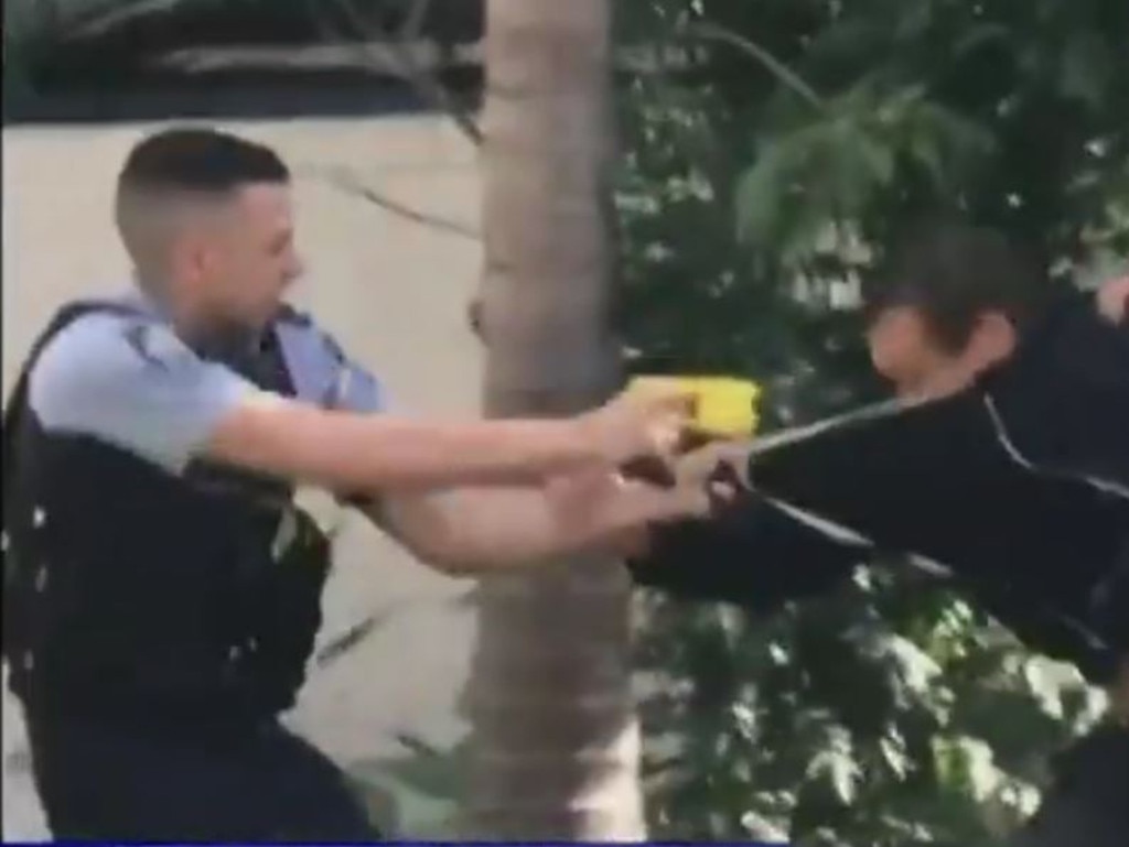 Kris Bradshaw is tasered in the face during his arrest in Paddington earlier in the year. Picture: Supplied