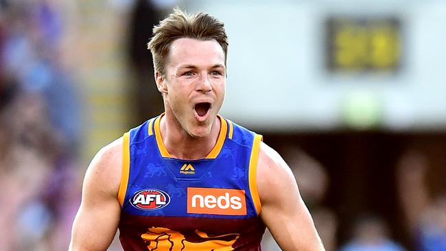 Lincoln McCarthy celebrates his matchwinner in Brisbane Lions’ thrilling victory over Geelong. Picture: Bradley Kanaris/AFL Photos via Getty Images.