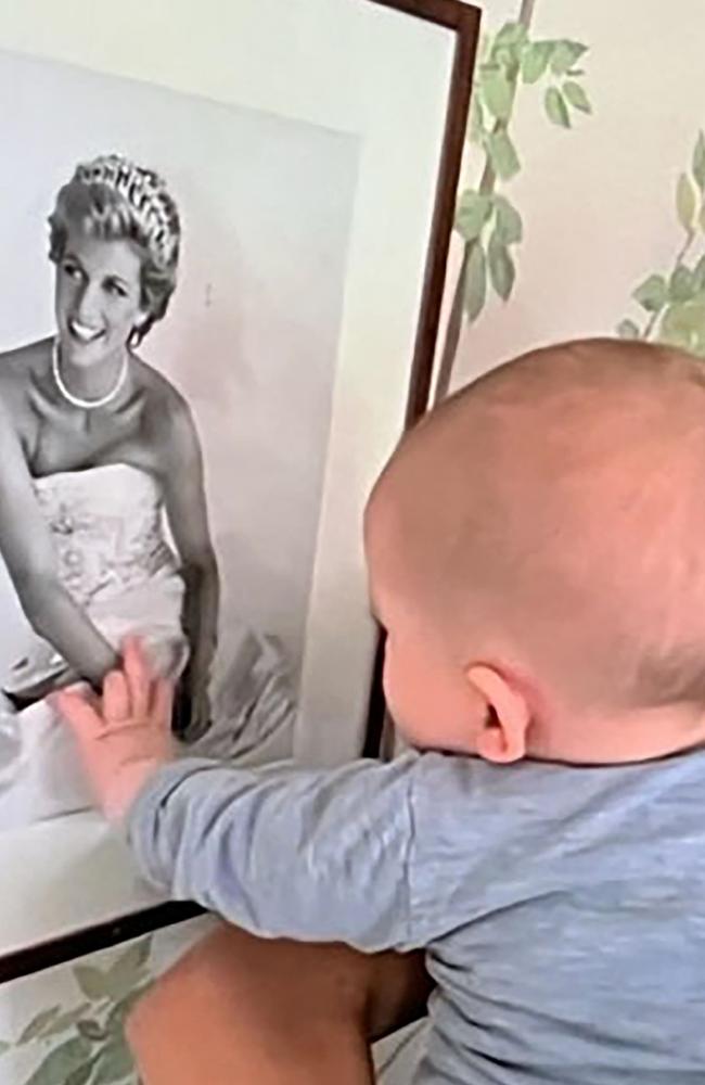 A baby Archie with a portrait of Princess Diana, which hangs in his nursery. Picture: Netflix
