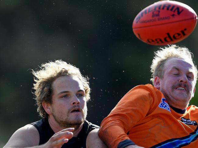 Gus Turner and Lyndhurst’s Jarryd McGrath compete for the ball. Picture: Andy Brownbill