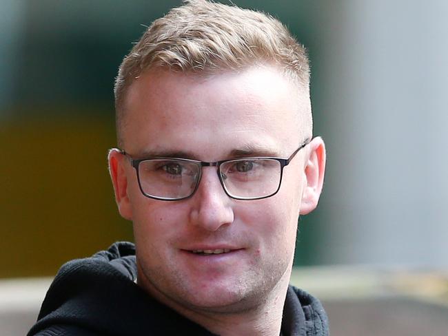 SYDNEY, AUSTRALIA - NewsWire Photos JULY 14, 2022: Zac Sweeney (centre) leaves the Downing Centre local court on Thursday. Sweeney is charged with commercial drug supply. Picture: NCA NewsWire / Nikki Short