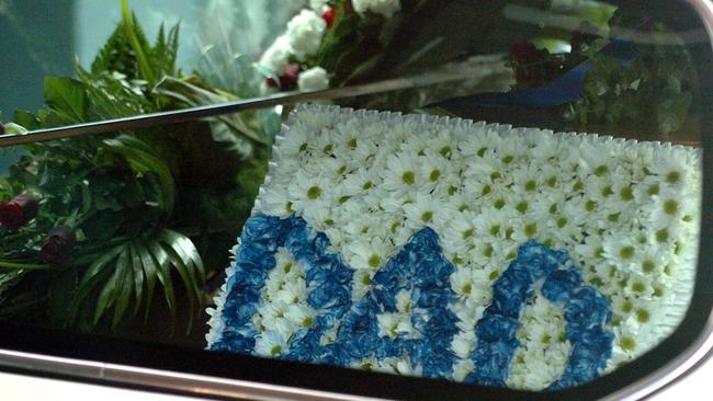  Terence Hodson's hearse leaves the chapel. 