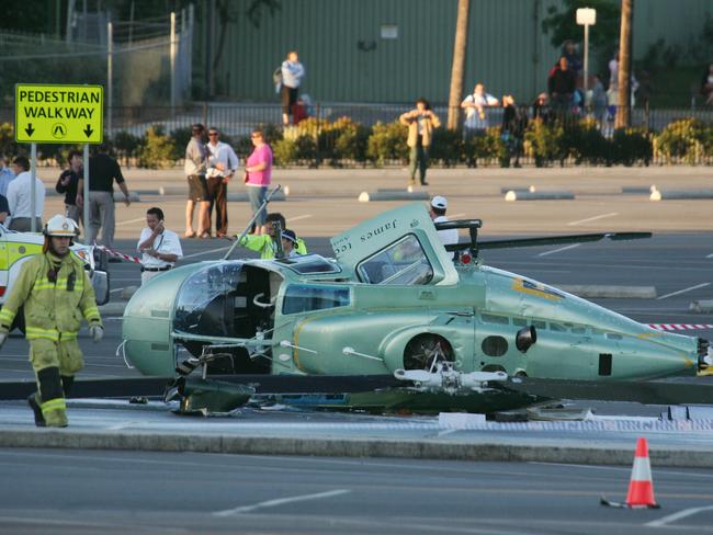 The helicopter crash in the Dreamworld car park in June 2009. Picture: Brendan Radke