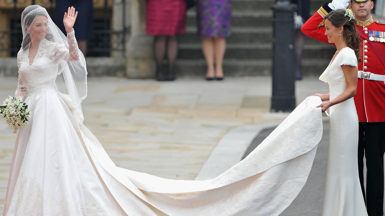 Kate’s sister Pippa helps with her train. Picture: Pascal Le Segretain/Getty