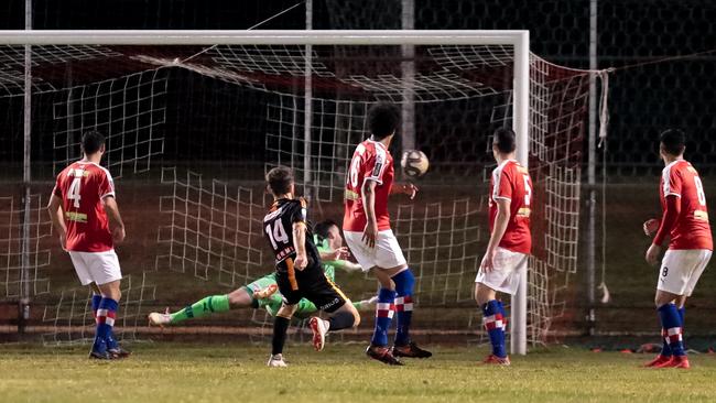 Former Adelaide United attacker Dylan Smith smashes in the only goal of the game in MetroStars’ triumph over Raiders. Picture: Adam Butler