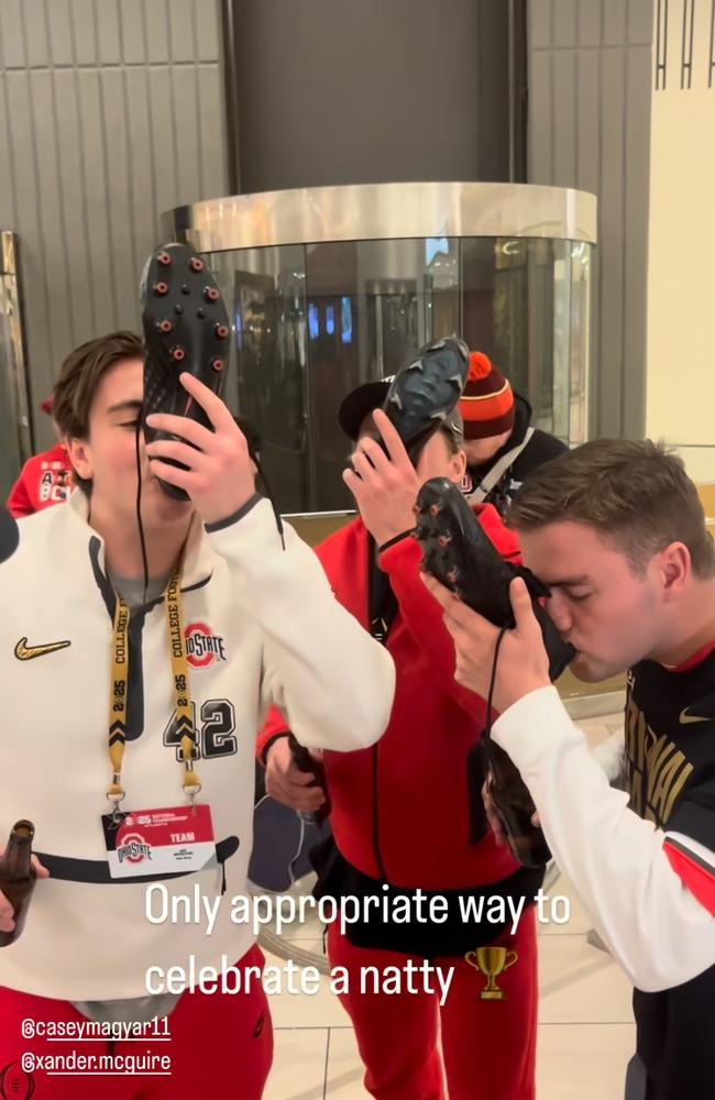 Joe and Xander McGuire celebrating the win with a shoey. Picture: Instagram