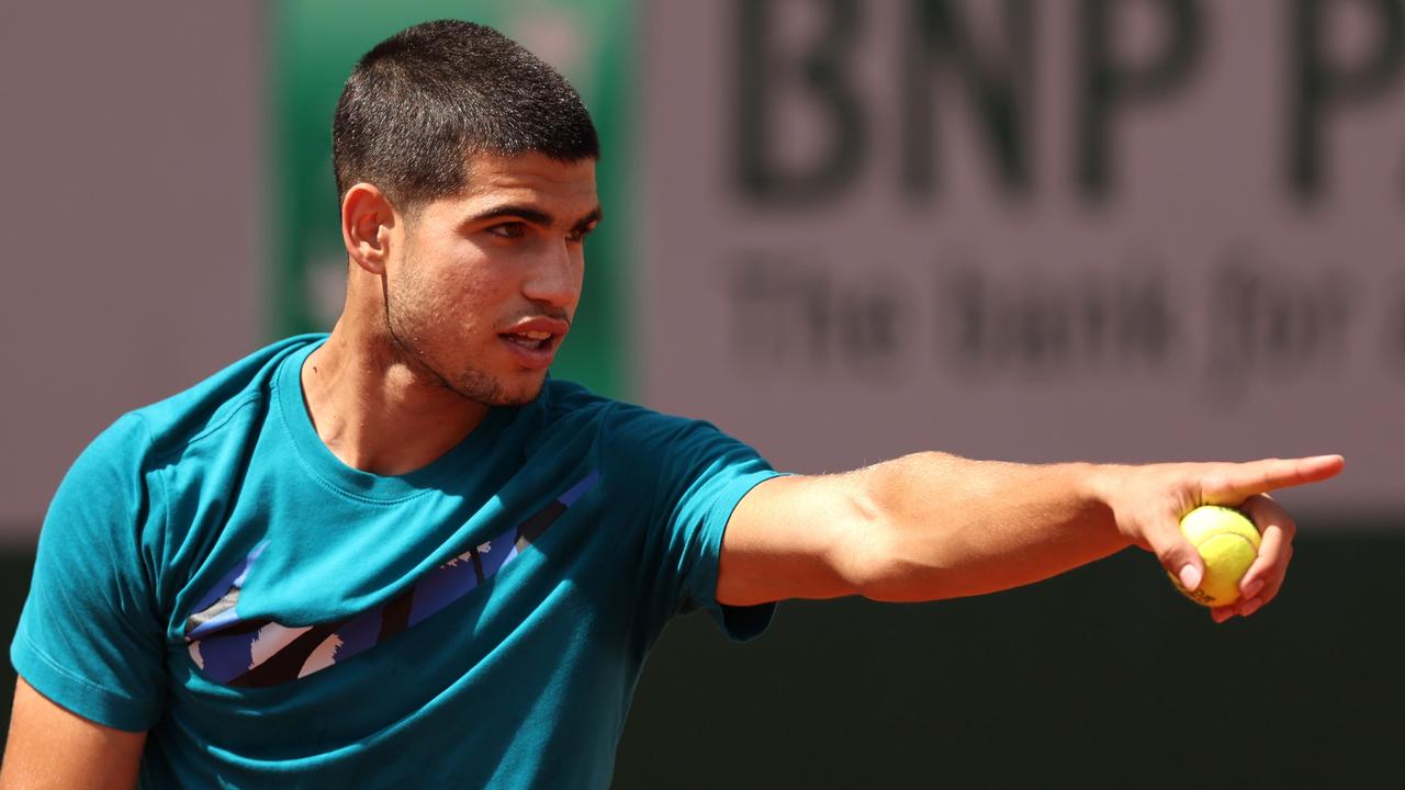 PARIS, FRANCE - MAY 21: Carlos Alcaraz of Spain reacts during a practice session prior to the start of the 2022 French Open at Roland Garros on May 21, 2022 in Paris, France. (Photo by Clive Brunskill/Getty Images)