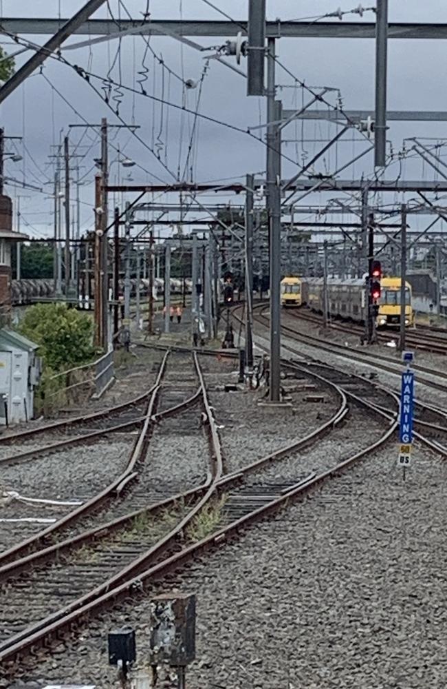 Hi-vis workers can be seen in the distance at Auburn Station. Picture: Supplied