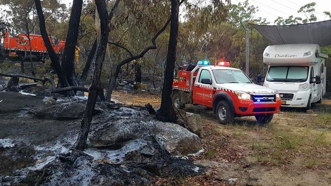 Fire reaches within metres of some homes and caravans. Picture: Supplied/Glenorie Rural Fire Service