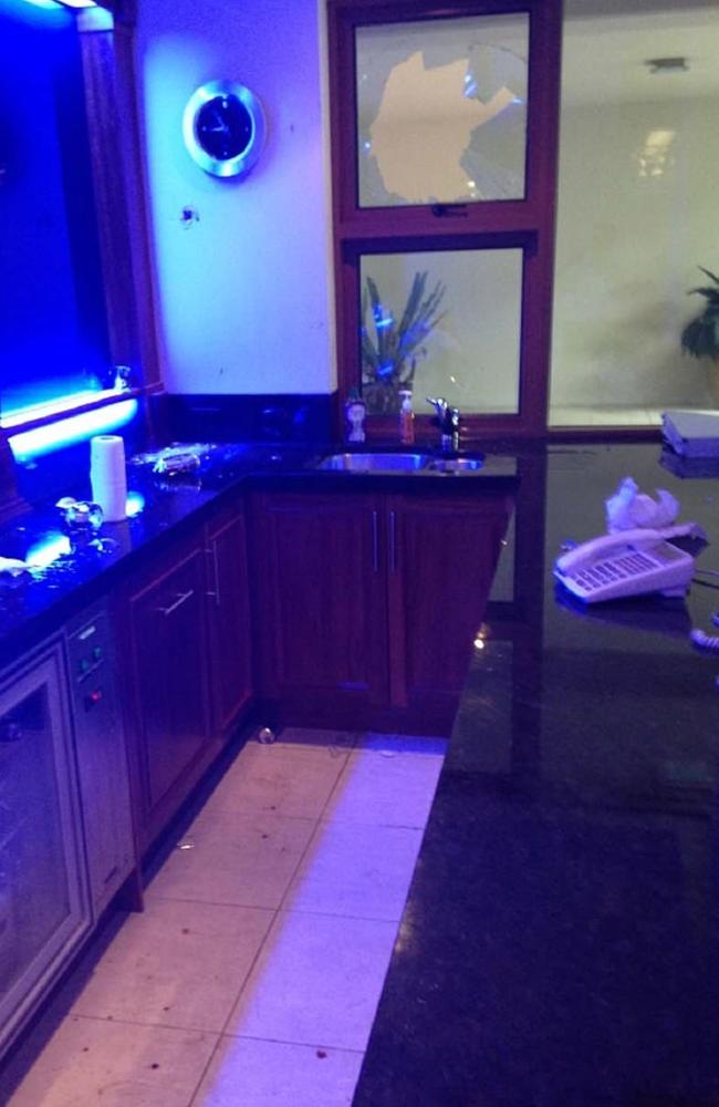 Photo submitted to court showing the kitchen/bar area of the couple’s rented Australian home – including an undamaged landline phone.