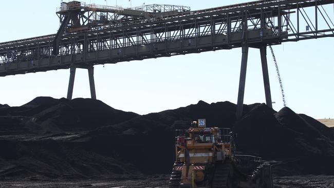 Coal in huge piles at the Liddell Power Station. Picture: David Swift