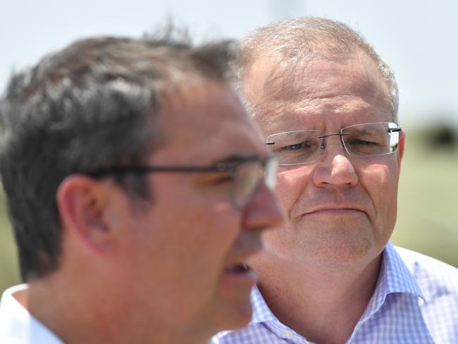 Premier Marshall has joined the Prime Minister Scott Morrison in handing out mountains of cash to voters in a bid to prop up the economy as it reels from the devastating impact of the pandemic. Photo: AAP/ David Mariuz