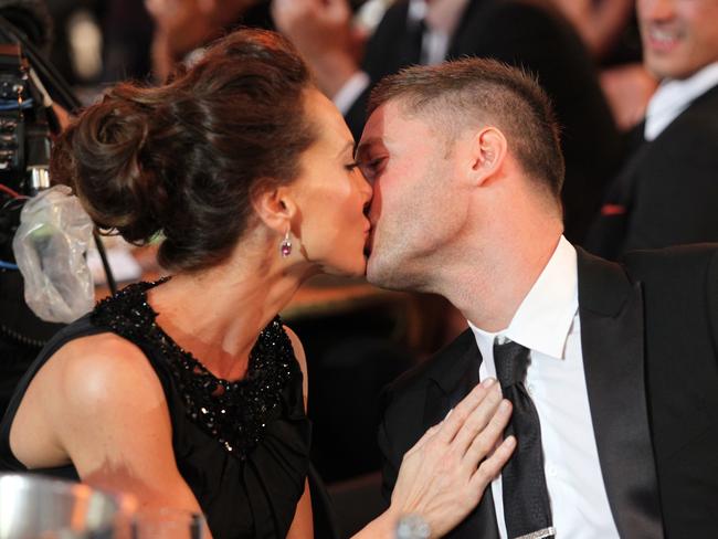 Michael Clarke kisses his girlfriend Kyly Boldy after he is announced as the Allan Border Medal winner for 2012 at the awards night in Melbourne in February. Picture: AAP