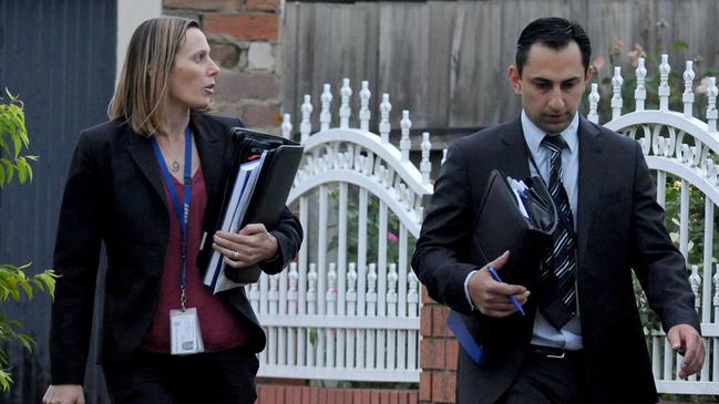 Detectives at the scene of the suspicious death. Picture: Andrew Henshaw