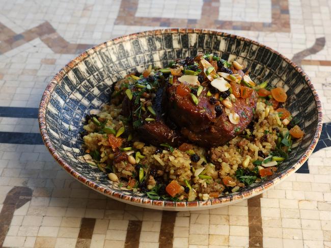 Slow cooked lamb shoulder with Lebanese lamb rice mixed nuts currents and jus, Byblos restaurant Portside Wharf. Picture: Liam Kidston