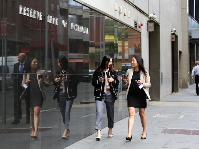 SYDNEY, AUSTRALIA - NewsWire Photos MARCH 02, 2021: A general view of woman walking past the Sydney Reserve Bank in Martin Place  in Sydney, Australia. Picture: NCA NewsWire / Gaye Gerard