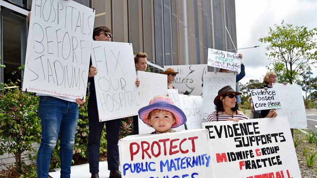 Kelly Ponsford and daughter Caitlin, 2, were among protesters at the official opening of the Northern Beaches Hospital on Monday. Picture: Troy Snook.