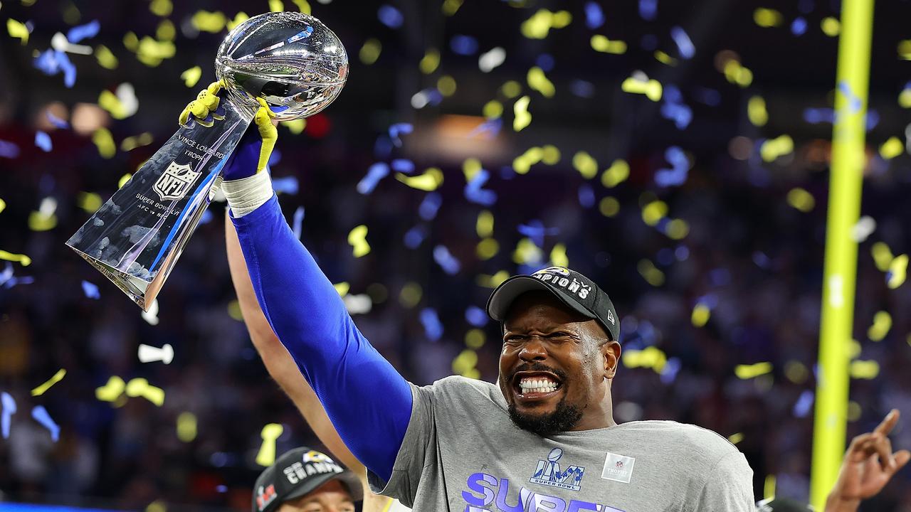 Von Miller #40 of the Los Angeles Rams holds up the Vince Lombardi Trophy after Super Bowl LVI at SoFi Stadium on February 13, 2022 in Inglewood, California. (Photo by Kevin C. Cox/Getty Images)