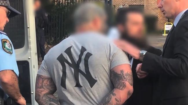 A senior Finks figure is arrested in North Wollongong in February this year by the Criminal Groups Squad.