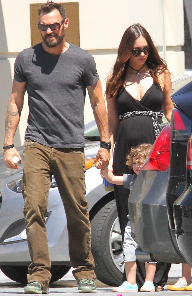 Still hanging out... Pregnant Megan Fox and estranged husband Brian Austin Green are spotted taking their sons Noah and Bodhi to the Farmers Market in Studio City, California on April 17, 2016. Picture: BackGrid