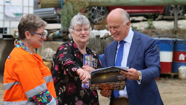 TP Bennett and sons business manager Tammy Price, her mother Carol Bennett and resources minister Eric Abetz at the multi-generational farm at Ranelagh. Picture: Elise Kaine