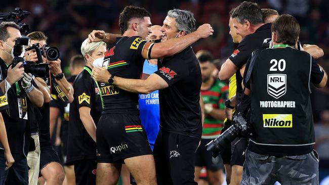 Nathan and Ivan Cleary come together after winning the 2021 NRL grand final. Picture: Adam Head