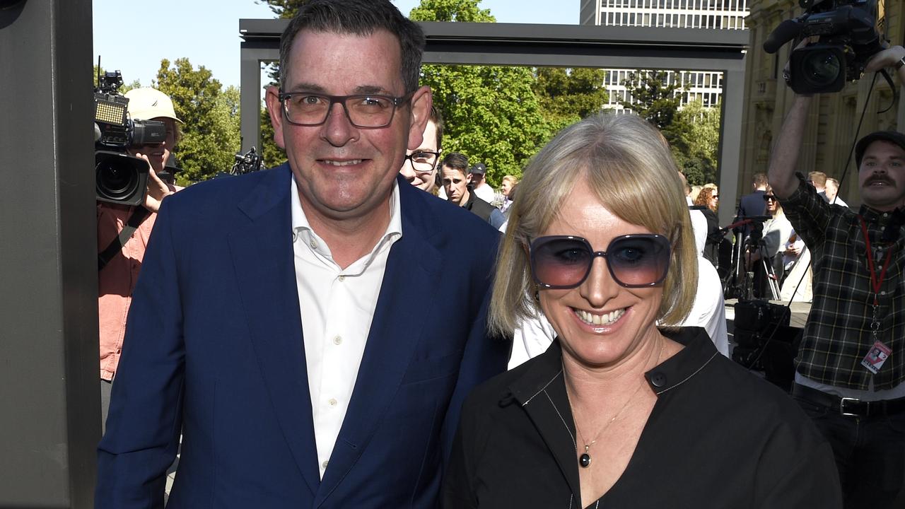 Daniel Andrews with wife Catherine after announcing his resignation. Picture: NCA NewsWire / Andrew Henshaw.