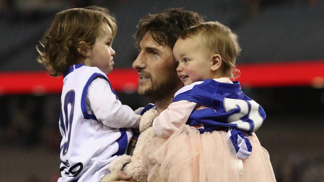 Jarrad Waite with his children Teddy and Lola after his last AFL game. 