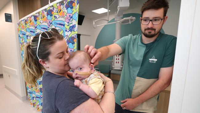 Parents Tonya Ryan and Wade Wulms of Moe with their baby Archer born 27 weeks premature and now seven months old in the new Special Care Nursery. Picture: David Caird