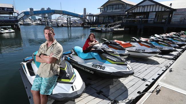 Adrian Bond, and Katie O'Neill (behind) of Jet Ski Safaris were amazed at how quiet their business and others surrounding had been during the Commonwealth Games.