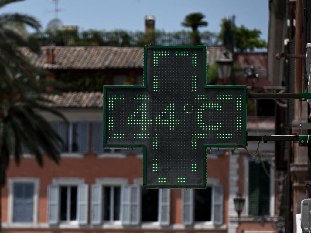 A pharmacy's sign indicating the current outside temperature near the Scalinata di Trinita dei Monti (Spanish Steps) in Rome. Picture: AFP