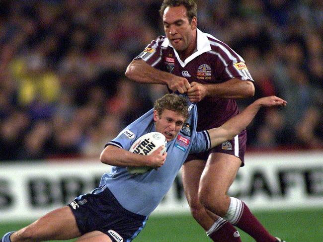 Gorden Tallis gives it to Brett Hodgson.