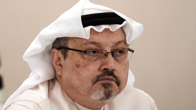 (FILES) In this file photo taken on December 15, 2014, general manager of Alarab TV, Jamal Khashoggi, looks on during a press conference in the Bahraini capital Manama. - US President Donald Trump said October 11, 2018 he was not yet prepared to limit arms sales to Saudi Arabia over journalist Jamal Khashoggi's disappearance, but he faced mounting pressure from concerned American lawmakers. Saudi Arabia is one of the world's largest arms purchasers, with most of them coming from the United States.Khashoggi, a contributor to The Washington Post, vanished more than a week ago during a visit to the Saudi consulate in Istanbul. Turkish government sources say he was murdered there, a claim Riyadh denies. (Photo by MOHAMMED AL-SHAIKH / AFP)