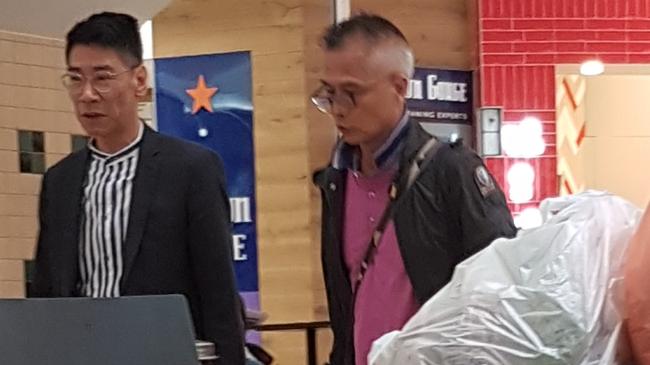 Rick Chan, left, and Hong Chen caught on camera in Box Hill.