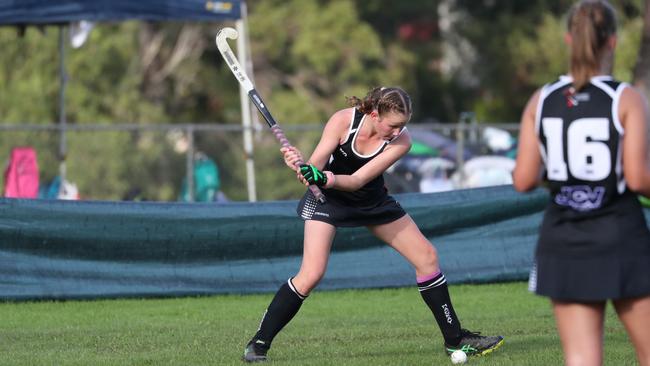 Skye Vaughan, 13, playing hockey for the Norths Hockey Club. Picture: Contributed