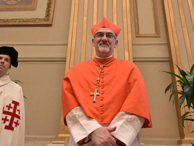 Newly elevated cardinal, Italian Latin Patriarch of Jerusalem Pierbattista Pizzaballa, attends a courtesy visit of relatives following a consistory for the creation of 21 new cardinals in The Vatican on September 30, 2023. Picture:/ AFP.