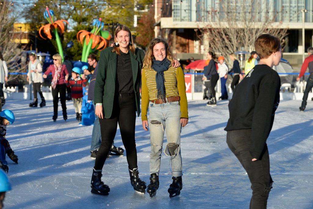 Grace Dewar (left) and Bronte Naylor ice skating at Winter Wonderland in the Civic Square, Friday, June 22, 2018. Picture: Kevin Farmer