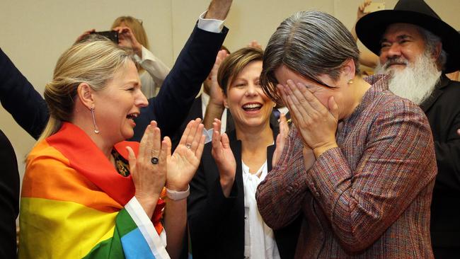 And immediately after the vote — Penny Wong breaks down, as Senator Louise Pratt and Jenny McAllister applaud. Picture Gary Ramage